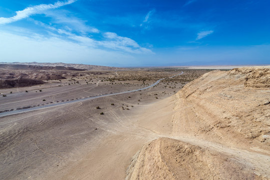 Aerial view with a road on Maranjab Desert in Iran