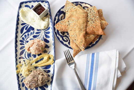 Platter of pates, bread and pickles 