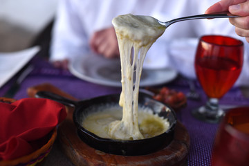 Melted cheese in skillet 