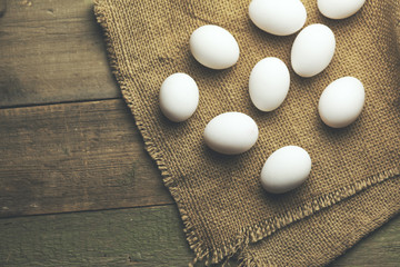 Fototapeta na wymiar fresh chicken eggs on wood table