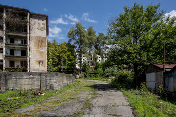 Abandoned mining ghost-town Polyana, Abkhazia. Destroyed empty houses 