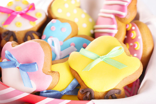 Box with tasty Easter cookies, closeup