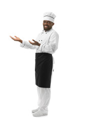 African American chef in uniform on white background