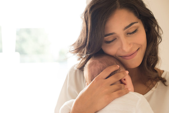 Woman With Newborn Baby