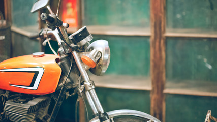 Fototapeta premium Old rusty handlebar mustard yellow motorcycle. (vintage style)