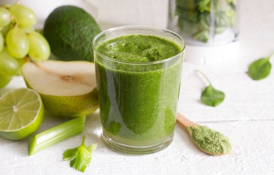 Green smoothie with fruits and vegetables food diet concept

