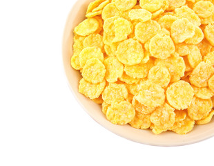 Bowl with cornflakes on white background