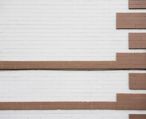 White Brick Wall with Brown Accents