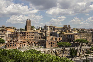 Fototapeta na wymiar Rome overview with monument and several streets, roofs, domes, Coliseum, Imperial Forum, Rome, Italy