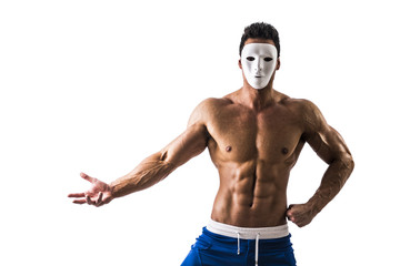 Fototapeta na wymiar Shirtless muscle man with creepy, scary mask on tilted head, isolated on white background
