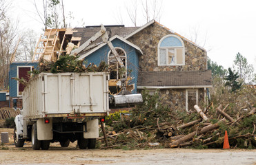 Fototapeta na wymiar Tree Removal at a Tornado Damaged House