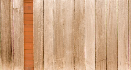 Wood Fence with Brick Accent