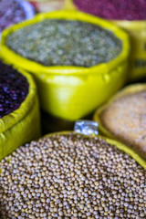 Sacks Of Healthy Legumes And Grains on vietnamese street market. Beans, peas and lentils in big bags. Selective focus.