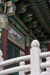 Naklejka premium Vertical view of Traditional Colourful Korean Roof or Temple at Seoul, South Korea. Selective focus.