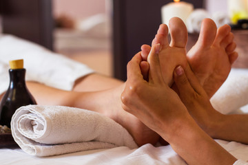 Fototapeta Massage of human foot in spa salon - Soft focus obraz