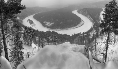 Winter river landscape, top view in black and white.