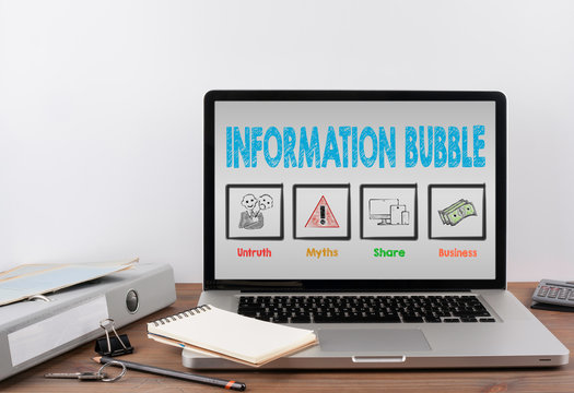 Information Bubble. Wooden Office desk with a laptop