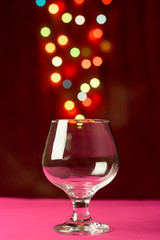 Wine glass with a light bokeh in the background