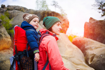 The mother and son are traveling.