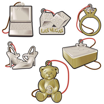 Teddy bear, dice, hot tub, laptop computer and high heels as gold and silver charms or jewellery.
