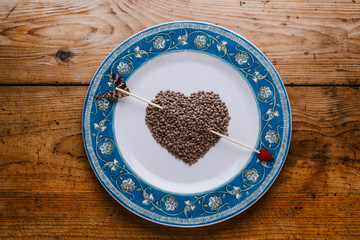 Dish with heart of lentils, valentines day