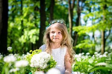 adorable lovely child in forest