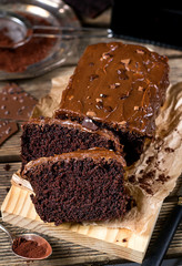 Moist chocolate cake with milk chocolate topping glaze