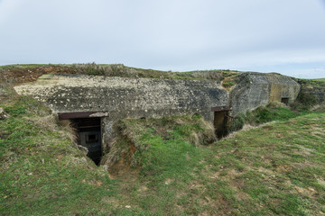 Fototapeta na wymiar German bunkers of Atlantic Wall and artillery battery of Longue
