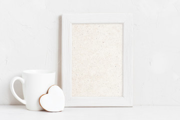 Vertical empty white wooden frame