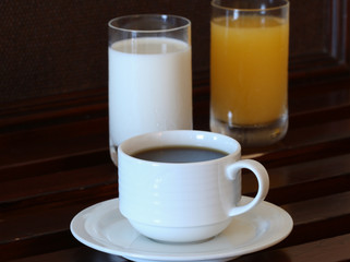 coffee, orange juice and milk for breakfast.