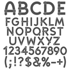 Letters, numbers and signs of cloth. Isolated objects on white. 