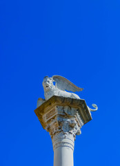 Fototapeta na wymiar The winged lion of St Mark, in Piazza delle Erbe, Verona