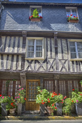 Fototapeta na wymiar Typical half-timbered house in Normandy (France)
