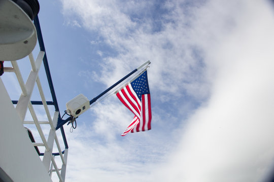 American Flag on Boat - Powered by Adobe