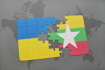 puzzle with the national flag of ukraine and myanmar on a world map