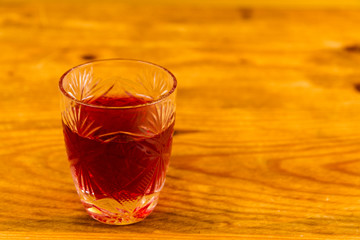 Glass of sloe gin