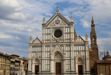 Fototapeta na wymiar Florence decorated facade of ancient Church called Santa Croce
