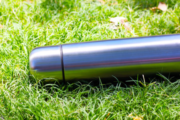 Thermos on the grass