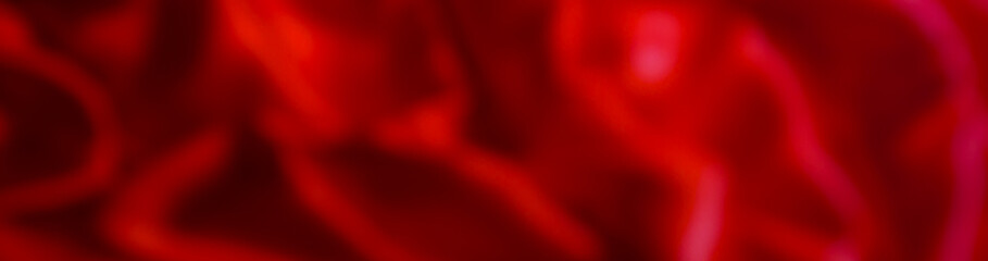 Glitter sparkling abstract red bokeh defocused background, border design panoramic banner