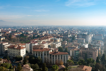 Fototapeta premium Foggy aerial view on Bergamo town, Lombardy, Italy 