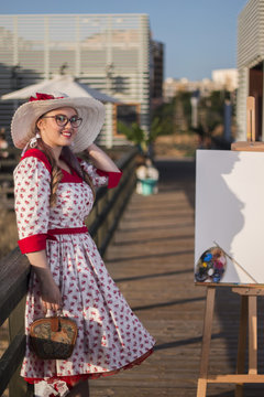 Cute pinup girl in the beach