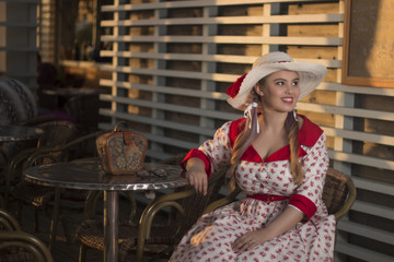 Cute pinup girl in the beach bar