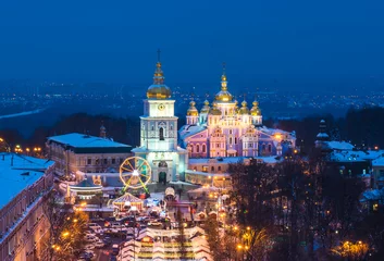 Raamstickers Aerial night view of Christmas Kyiv. Kiev. St Michael's Golden-Domed Monastery and Cathedral at Christmas night © Mariana Ianovska