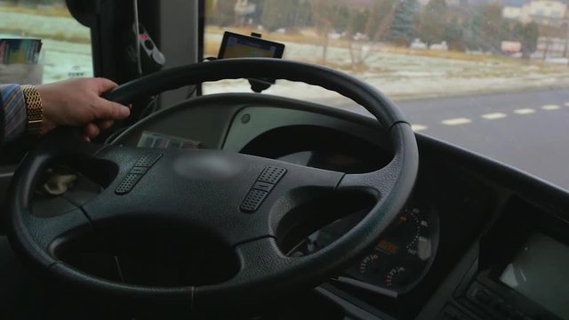 the driver of the bus leads. close-up wheel