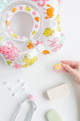baby accessories for bath with duck on white background