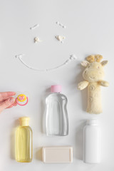 baby organic cosmetic for bath on white bakground top view