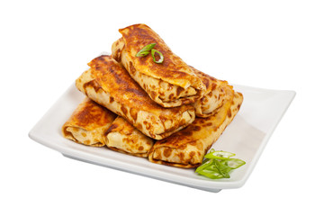 Russian Stuffed Pancakes Blintzes with Meat Isolated on White. Selective focus.