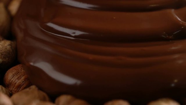 liquid chocolate cover the hazelnuts