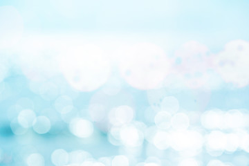 Blue water and sun reflections background