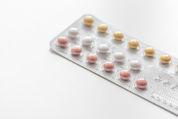 concept of female contraception on white background